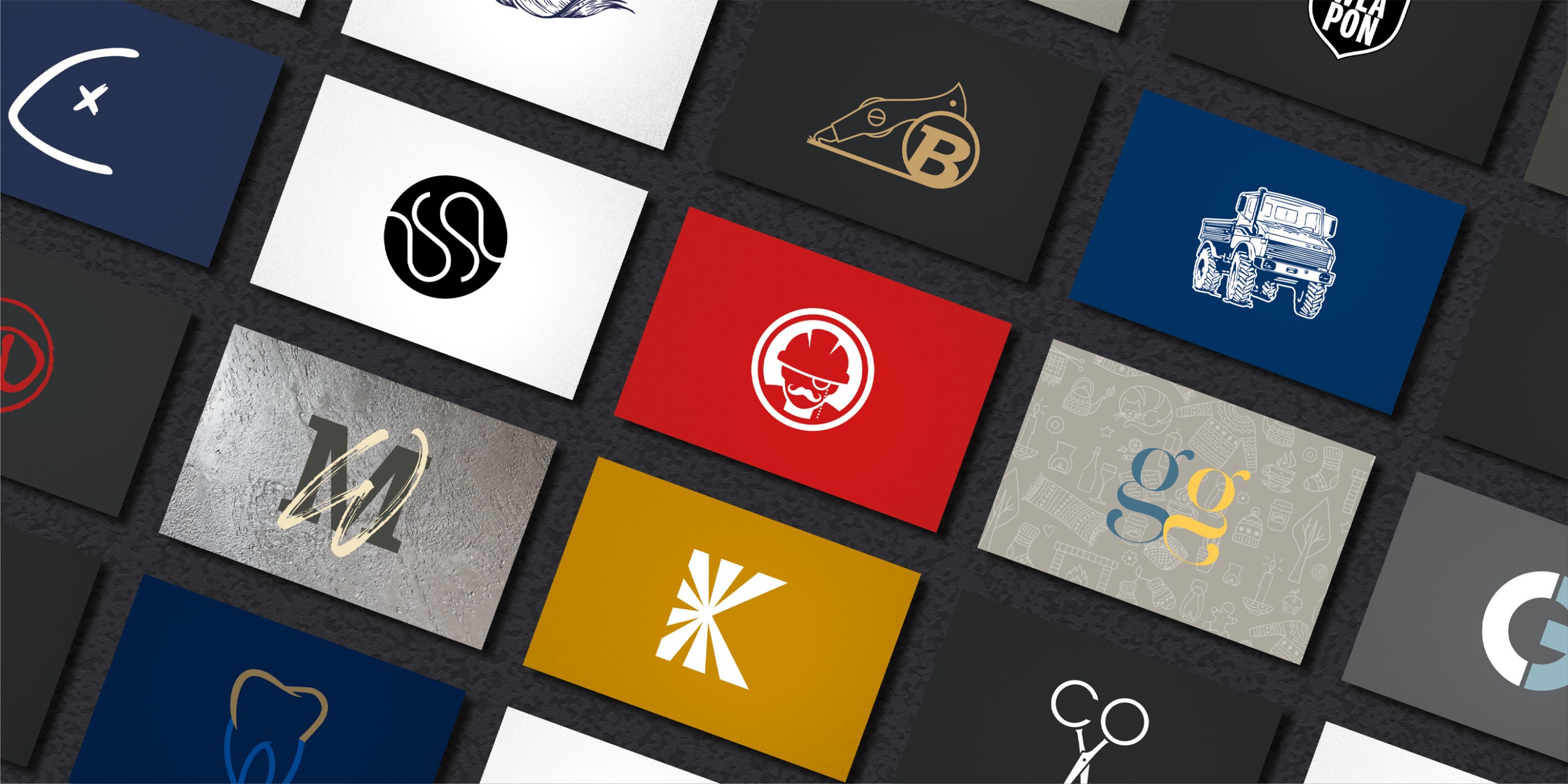 Mehrere Logos versetzt angeordnet auf dunkelgrauen Lederuntergrund. Kundenlogos von DaffneDesign. Giese Anwaeltin, Kumetat Brennholzverkauf, Swiss Rohrinspektor, Sockcess, Sonnenschutz Krueger, Wanddesign Mertes, Zahnarztpraxis Imajew, DJ Clubfish, Jacobs Friseur. Sowei Eigenmarkenlogos der Firma Schaefer Strumpffabrik, Sockcess, Hygge, Pocket Lingerie. DaffneDesign, Corporate Identity, Markenidentitaet, Brand Design.